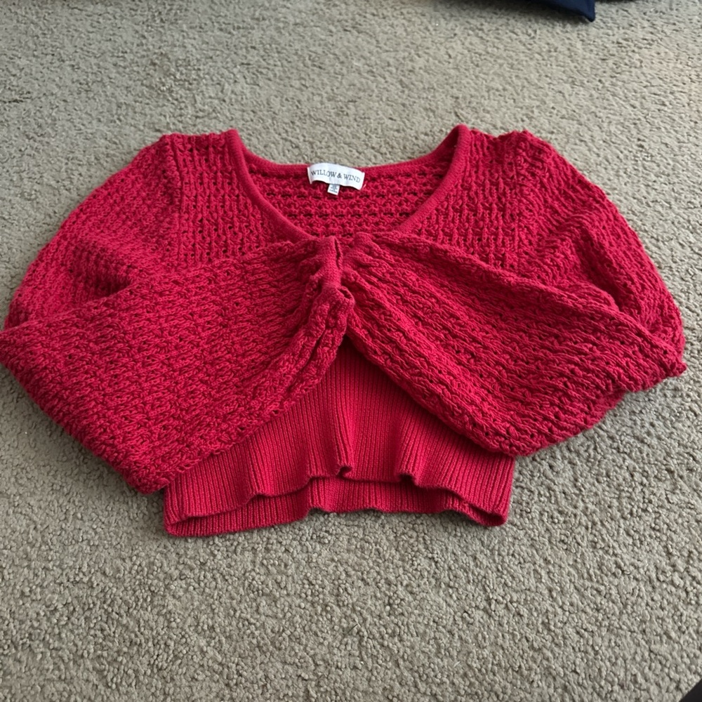 Red sweater throw over